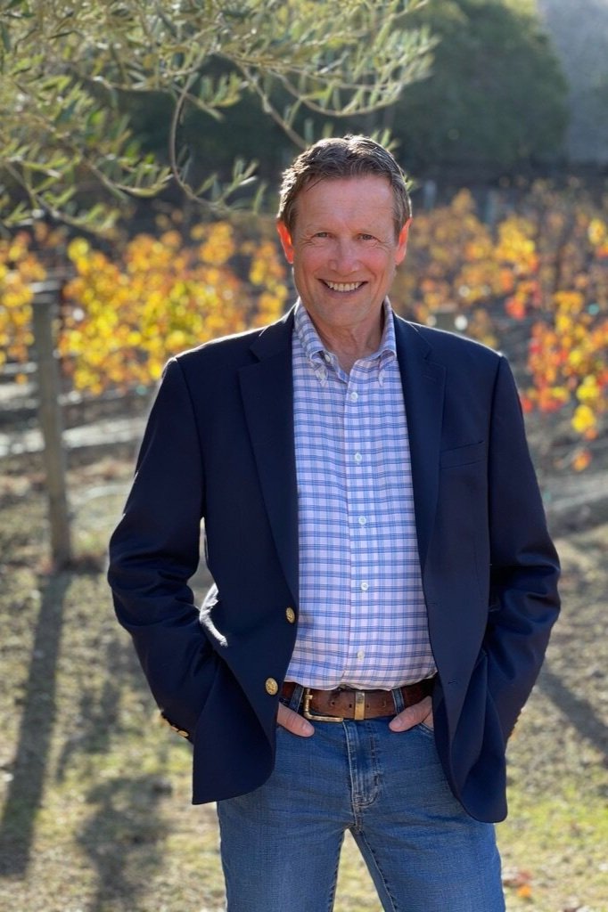 Bruce Barge standing in a Napa vineyard in autumn